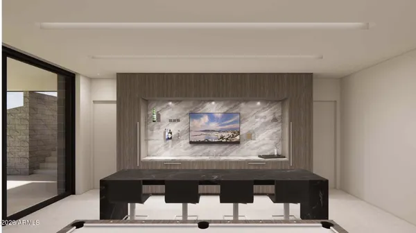 a dining room with furniture water view and a floor to ceiling window