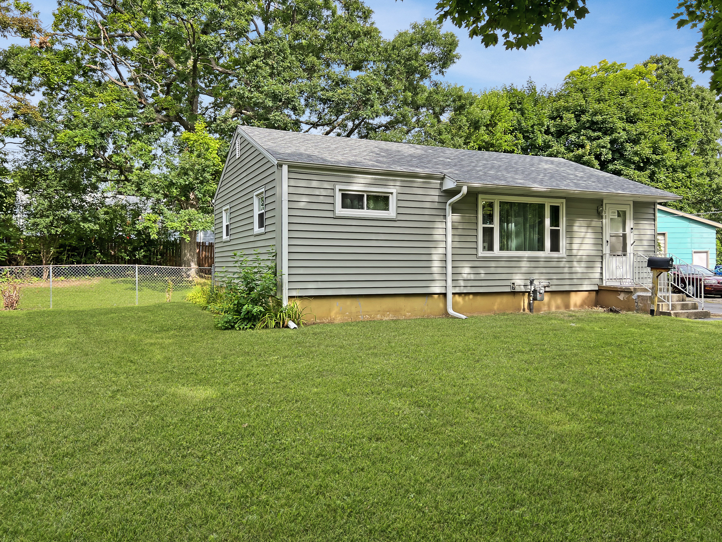 1926 Chippewa Road Waukegan, IL 60087 - Photo 2 of 13 a front view of house with yard and green space