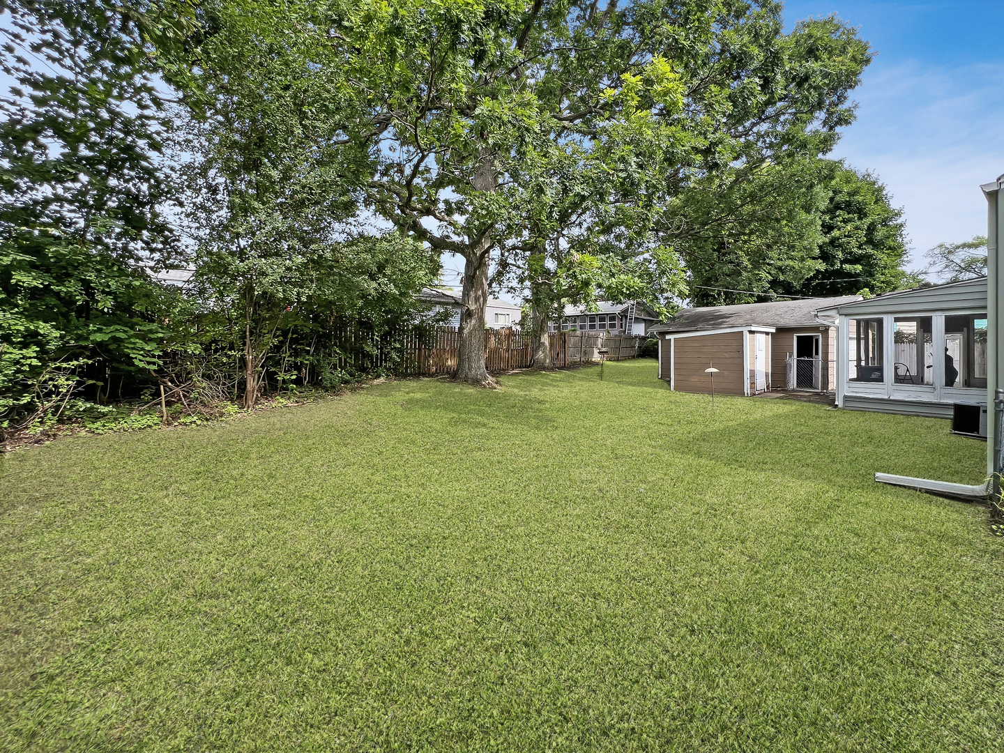 1926 Chippewa Road Waukegan, IL 60087 - Photo 4 of 13 a view of a house with a yard