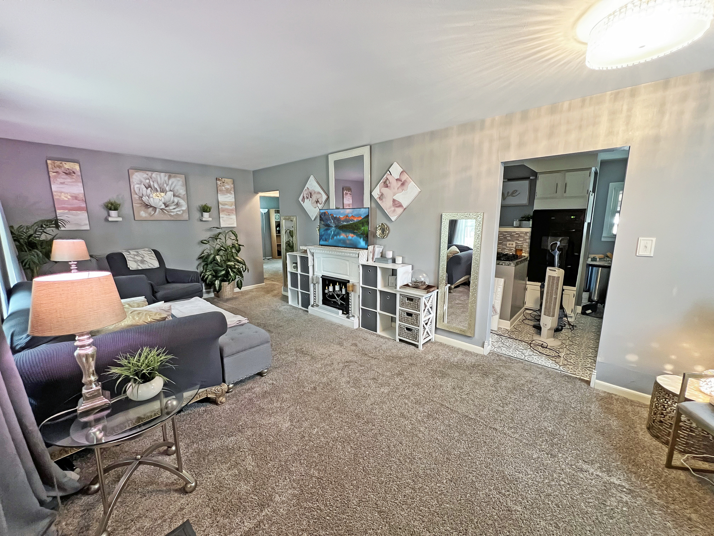 1926 Chippewa Road Waukegan, IL 60087 - Photo 8 of 13 a living room with furniture and a flat screen tv