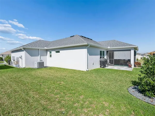 an aerial view of a house with garden