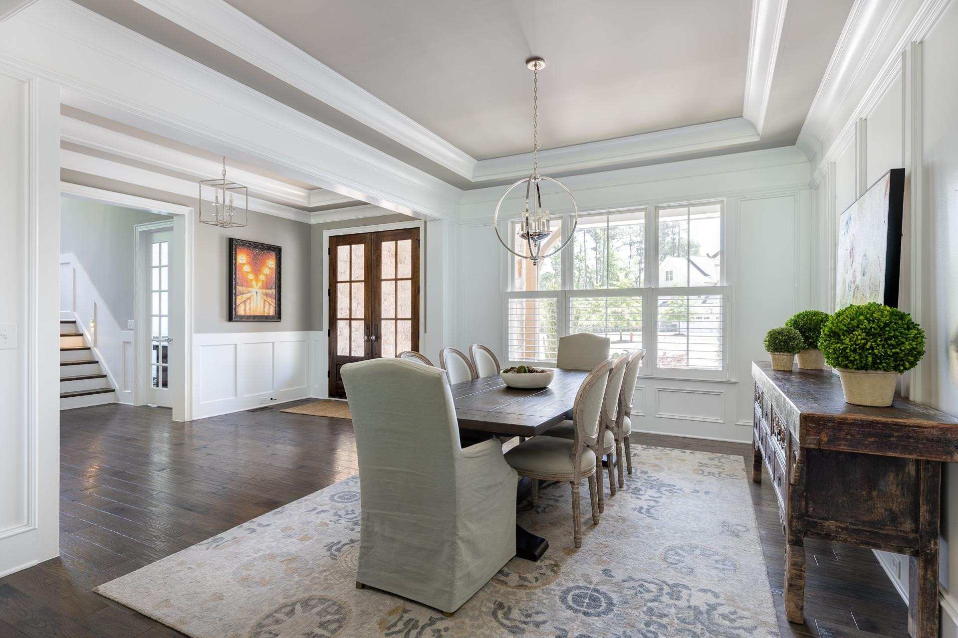 116 Turner Ridge Circle Durham, NC 27713 - Photo 12 of 63 a dining room with furniture a chandelier and wooden floor