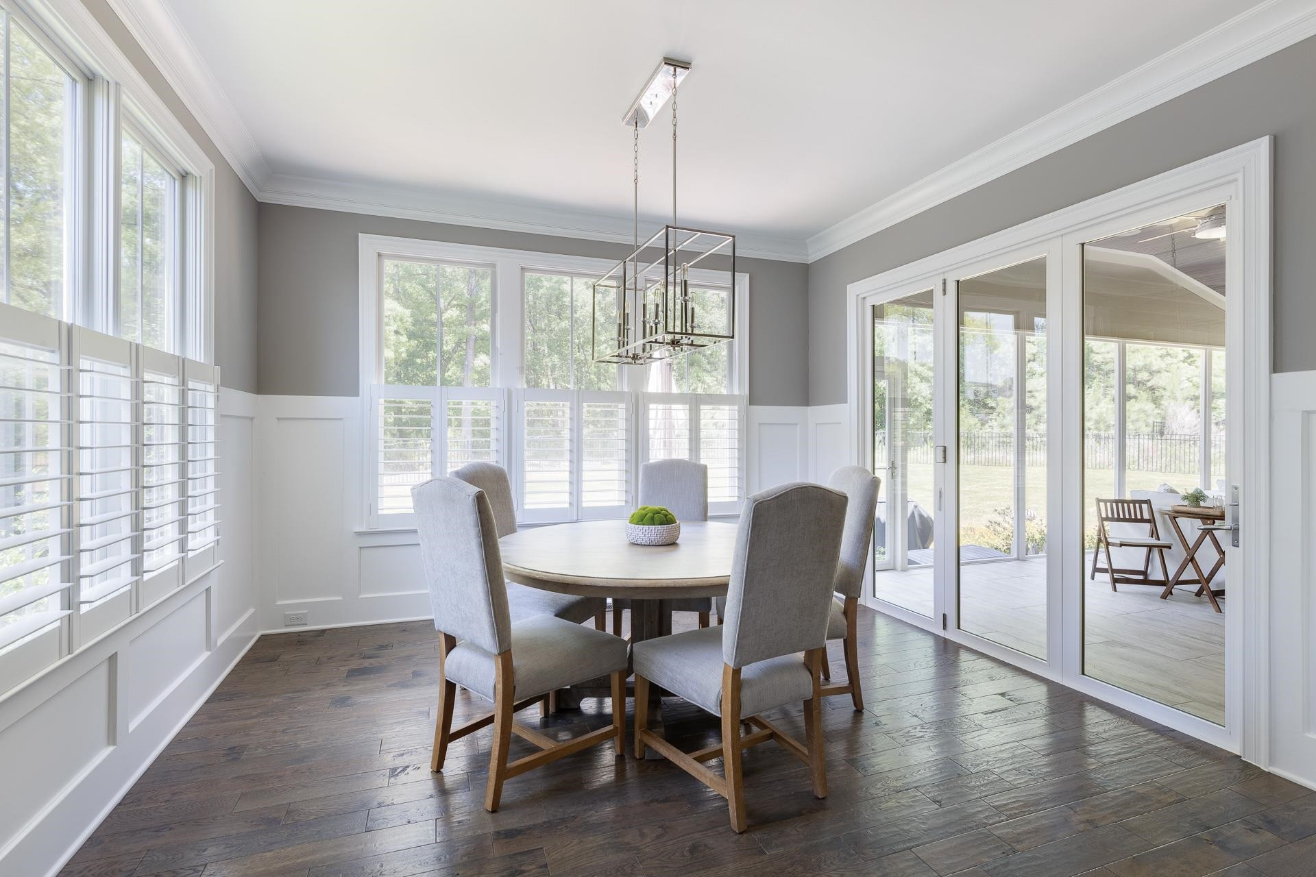 116 Turner Ridge Circle Durham, NC 27713 - Photo 19 of 63 a dining room with furniture a chandelier and wooden floor