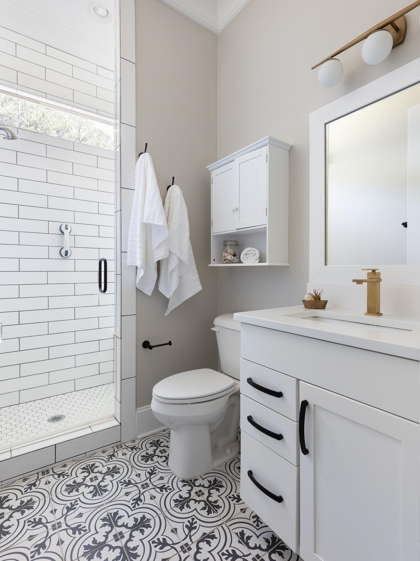 116 Turner Ridge Circle Durham, NC 27713 - Photo 27 of 63 a bathroom with a sink a toilet and shower