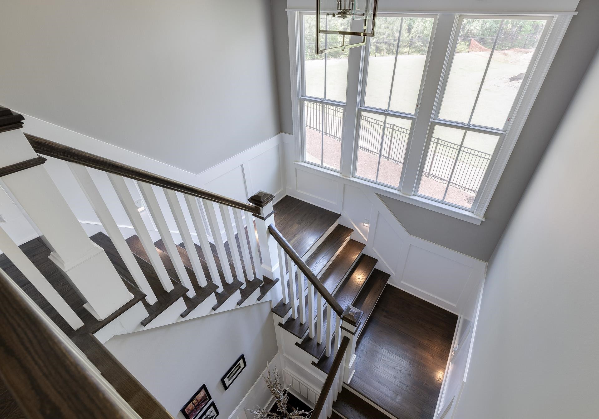 116 Turner Ridge Circle Durham, NC 27713 - Photo 29 of 63 a view of staircase with wooden floor and white walls