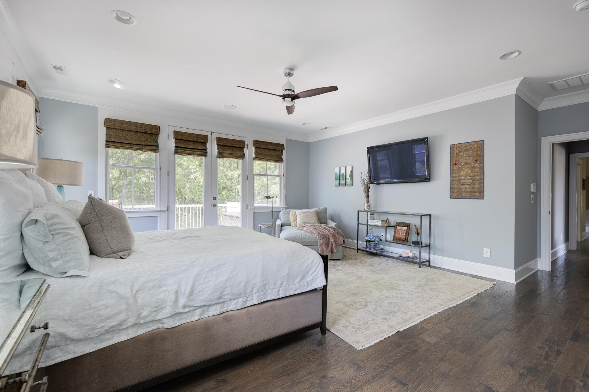 116 Turner Ridge Circle Durham, NC 27713 - Photo 32 of 63 a bedroom with bed couches and flat tv screen