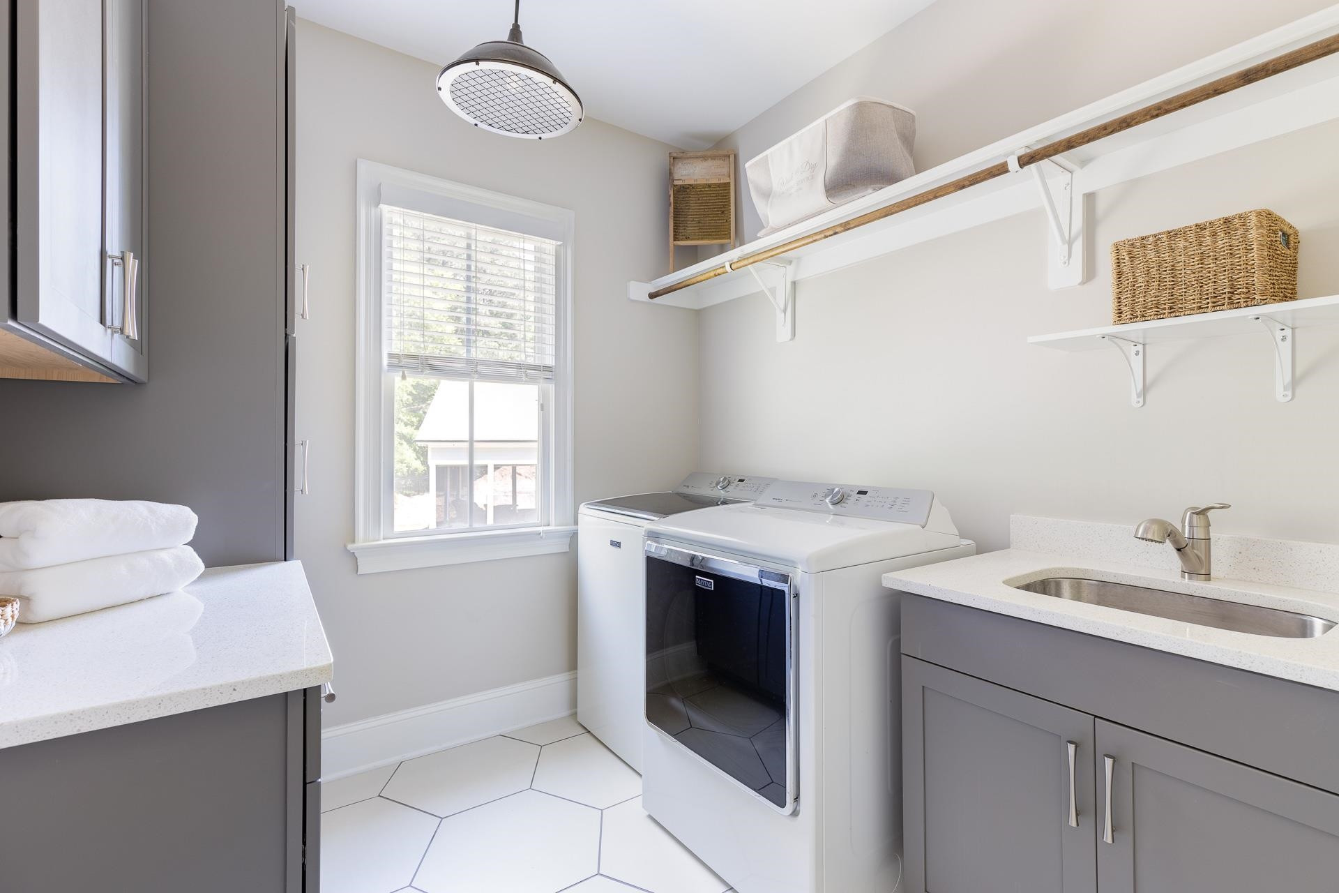 116 Turner Ridge Circle Durham, NC 27713 - Photo 42 of 63 a utility room with a sink a washer and dryer