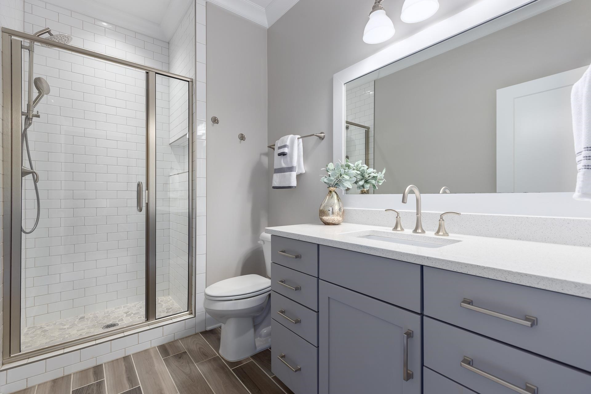 116 Turner Ridge Circle Durham, NC 27713 - Photo 48 of 63 a bathroom with a sink toilet a mirror and shower