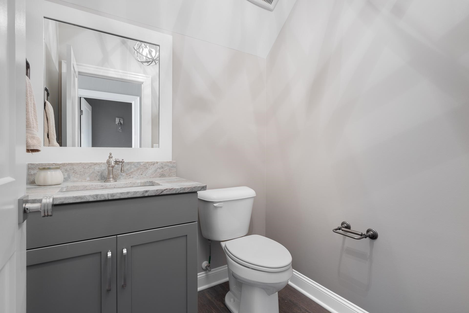 116 Turner Ridge Circle Durham, NC 27713 - Photo 51 of 63 a bathroom with a granite countertop sink a toilet and a mirror