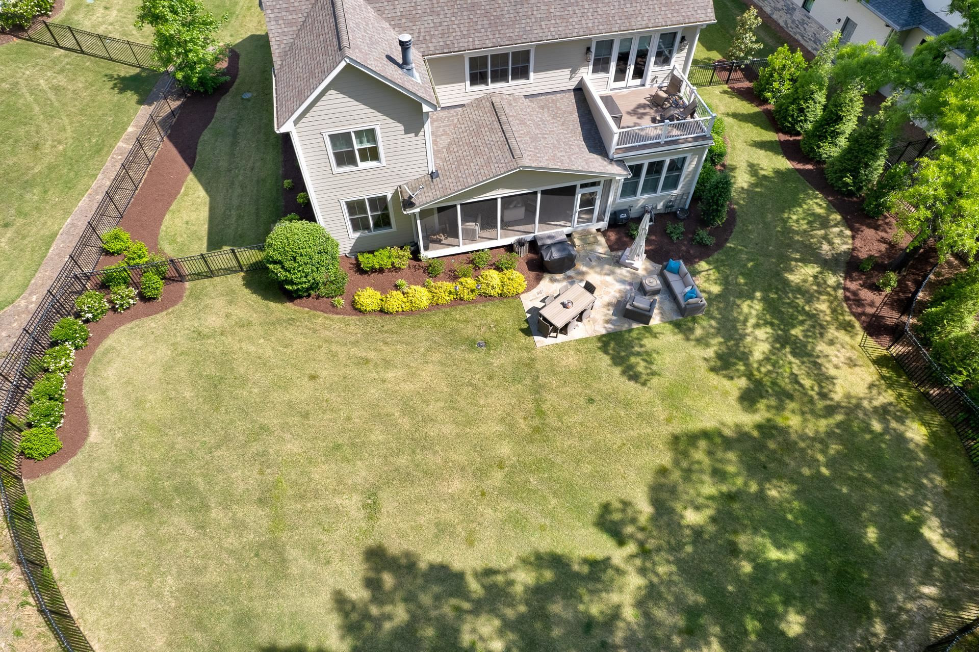 116 Turner Ridge Circle Durham, NC 27713 - Photo 61 of 63 an aerial view of a house with swimming pool and large trees