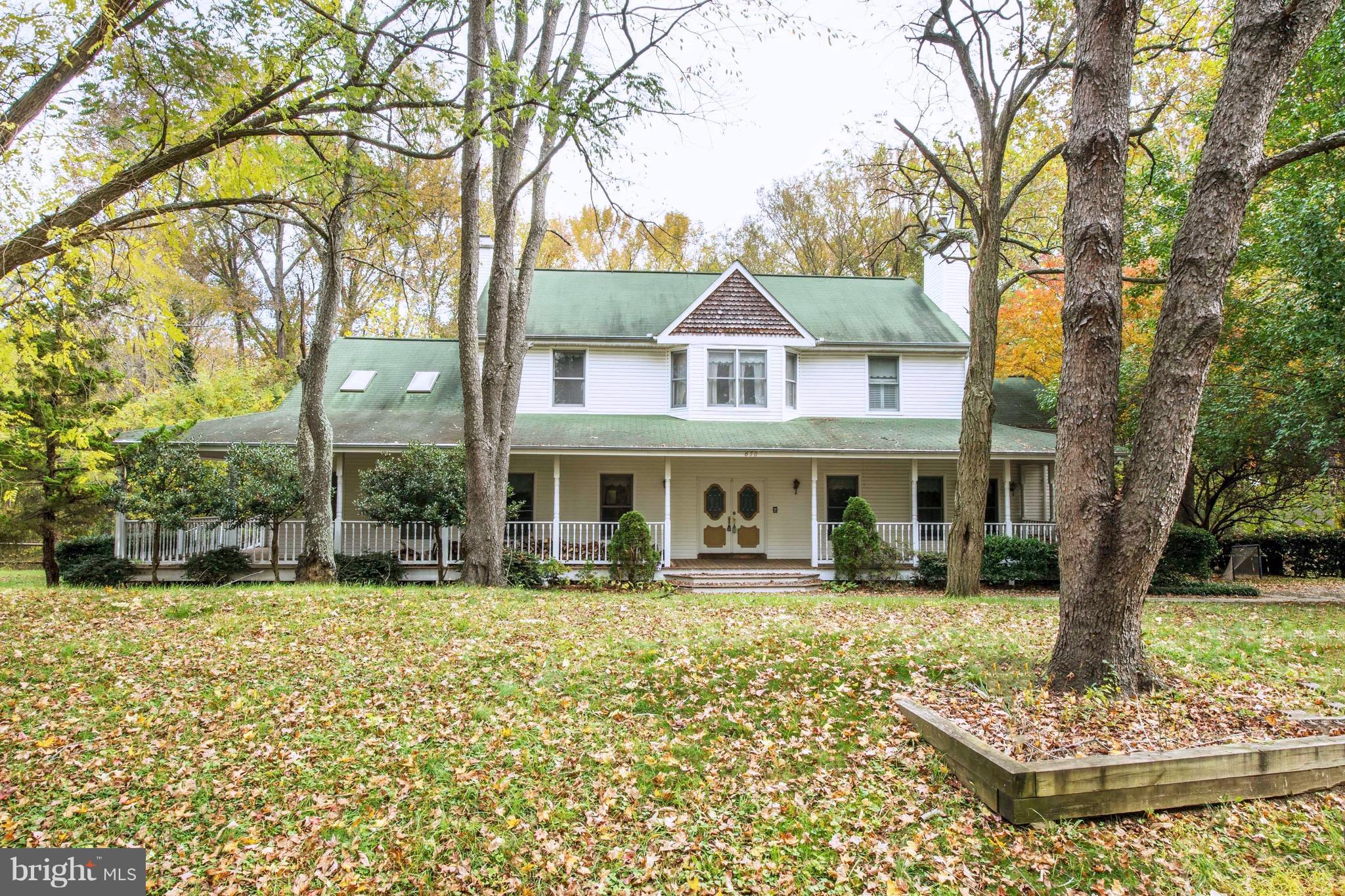 670 Hillmeade Road Edgewater, MD 21037 - Photo 1 of 30 front view of a house with a yard