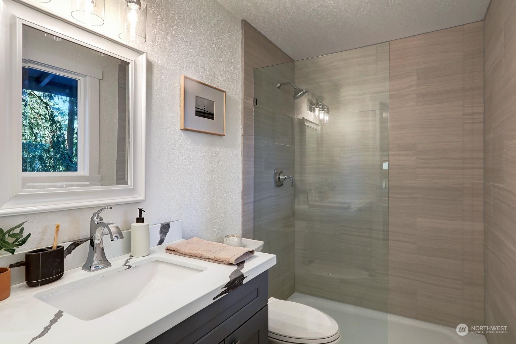 2029 Timber Trail Bothell, WA 98012 - Photo 11 of 24 a bathroom with a sink toilet and shower