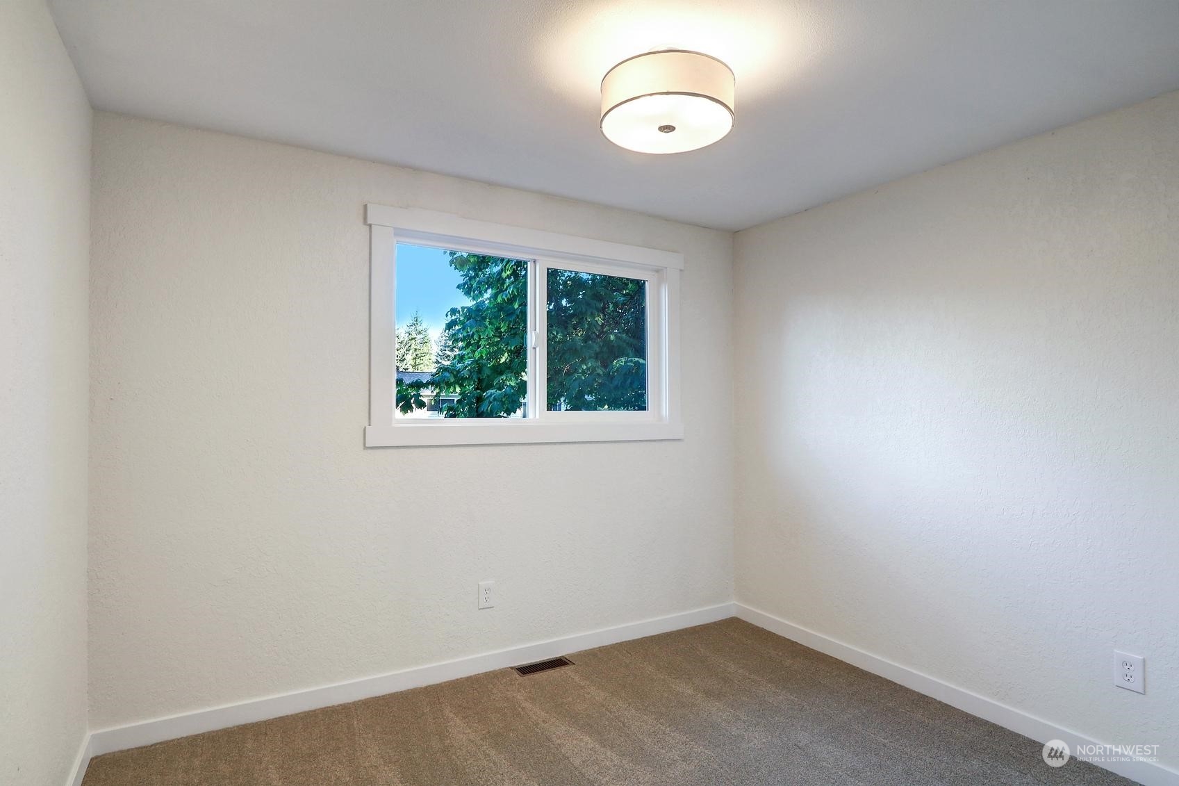 2029 Timber Trail Bothell, WA 98012 - Photo 17 of 24 an empty room with a window