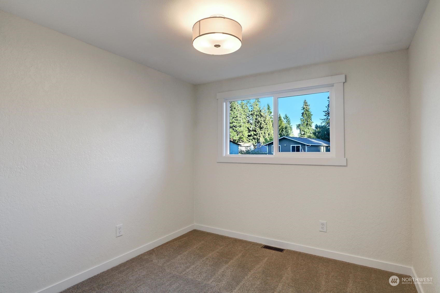 2029 Timber Trail Bothell, WA 98012 - Photo 19 of 24 an empty room with a window