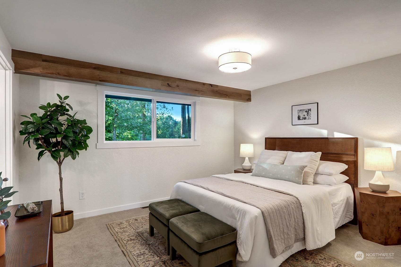 2029 Timber Trail Bothell, WA 98012 - Photo 9 of 24 a bedroom with a bed and a potted plant