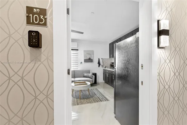 a bathroom with a toilet sink and shower