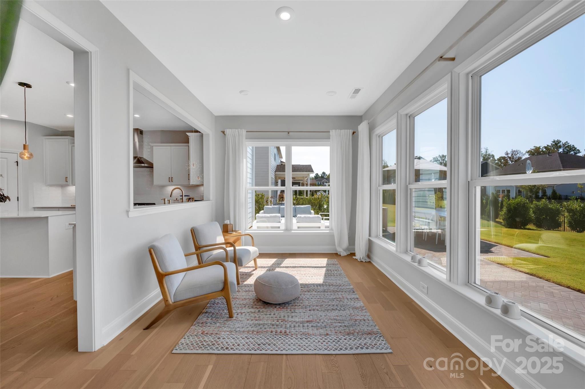 1185 Regions Boulevard Indian Land, SC 29707 - Photo 11 of 41 a living room with furniture and a large window