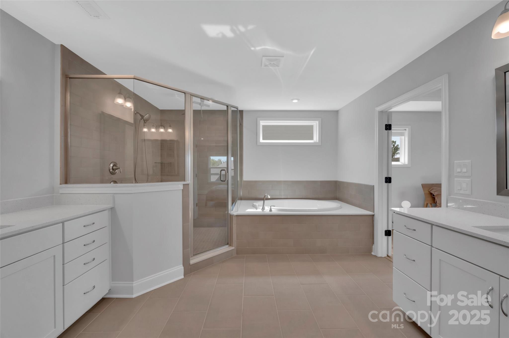 1185 Regions Boulevard Indian Land, SC 29707 - Photo 20 of 41 a bathroom with a tub sink and mirror