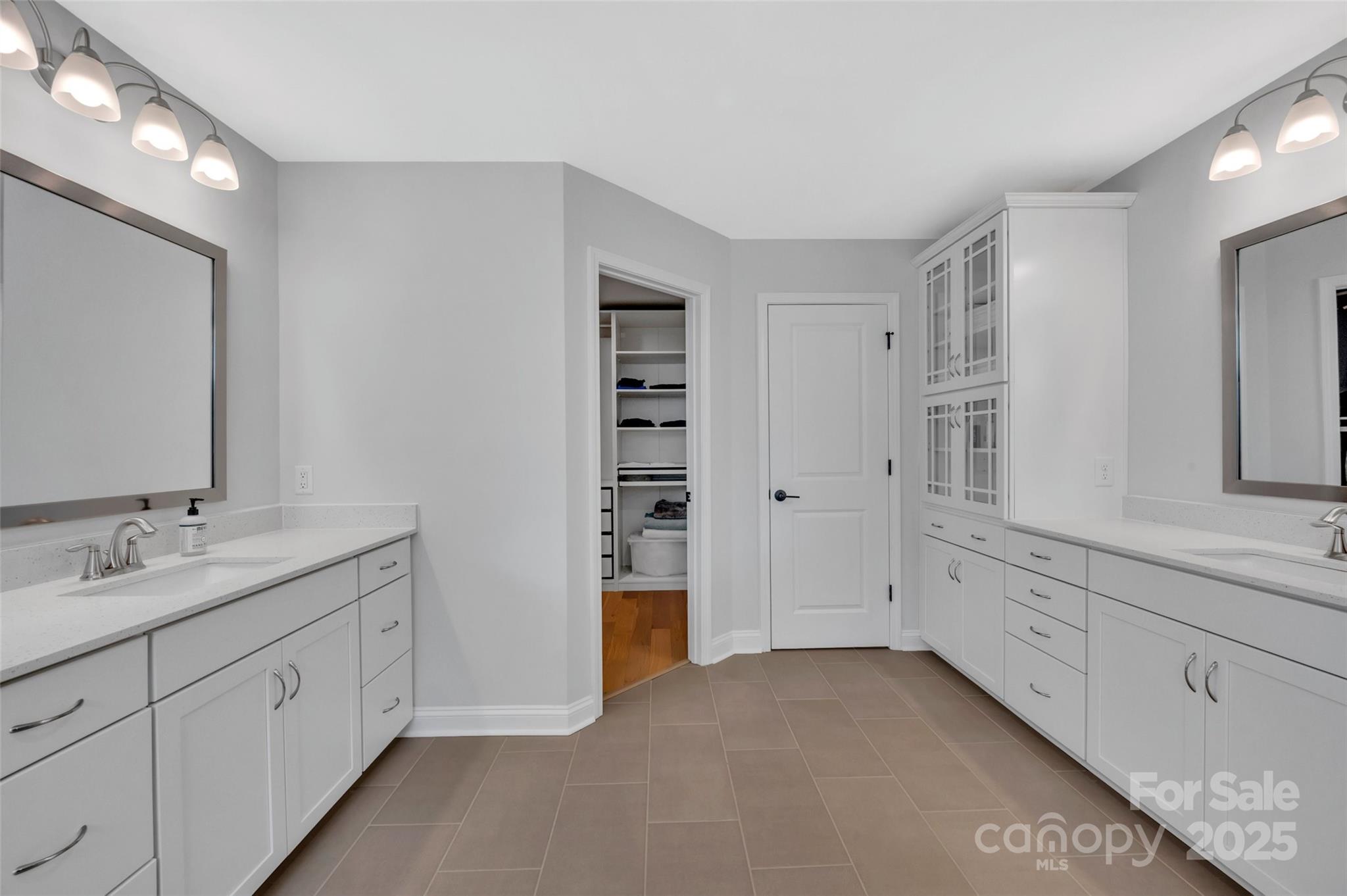 1185 Regions Boulevard Indian Land, SC 29707 - Photo 22 of 41 a bathroom with a double vanity sink and mirror