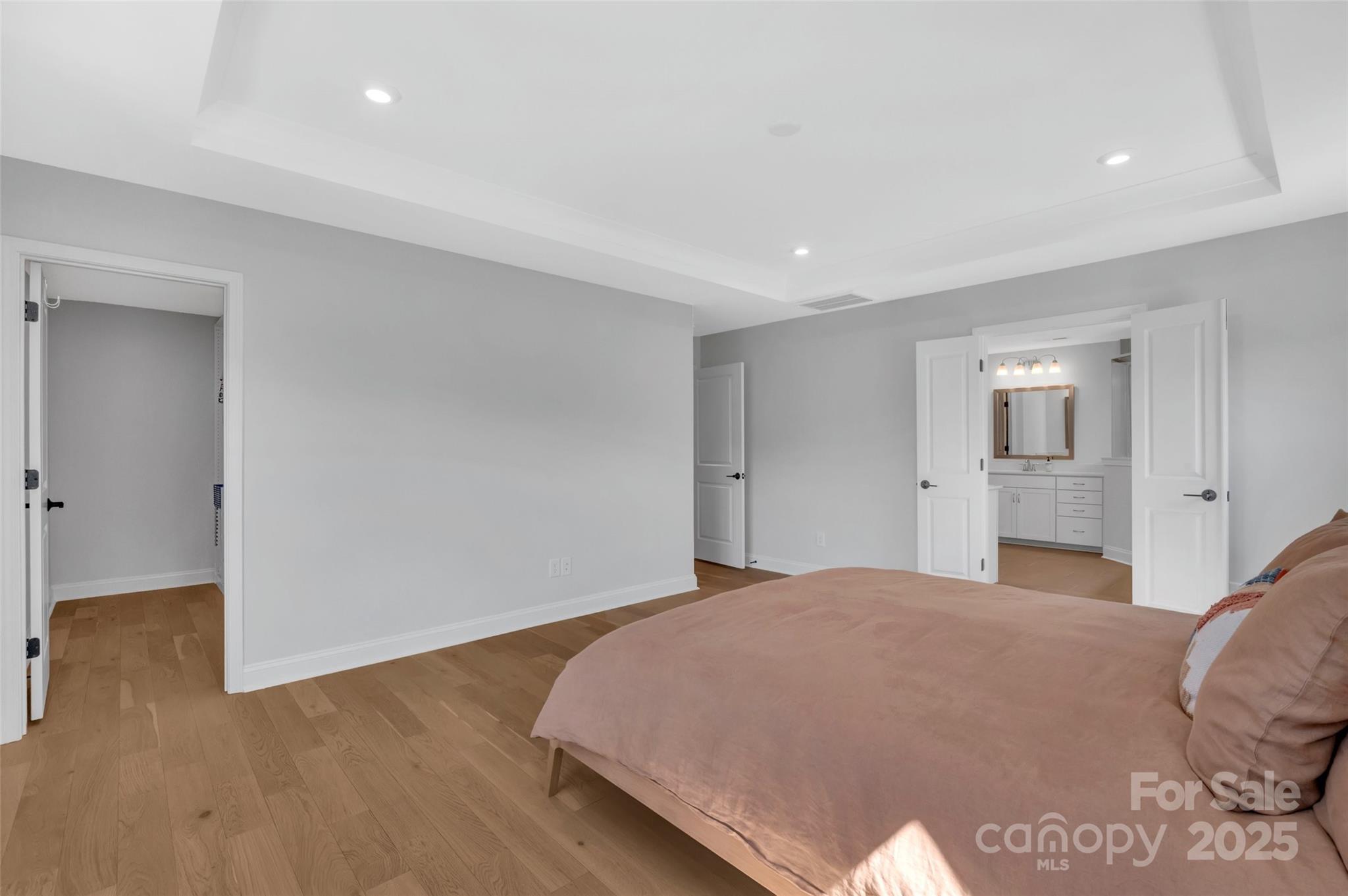 1185 Regions Boulevard Indian Land, SC 29707 - Photo 25 of 41 a bedroom with a bed and wooden floor
