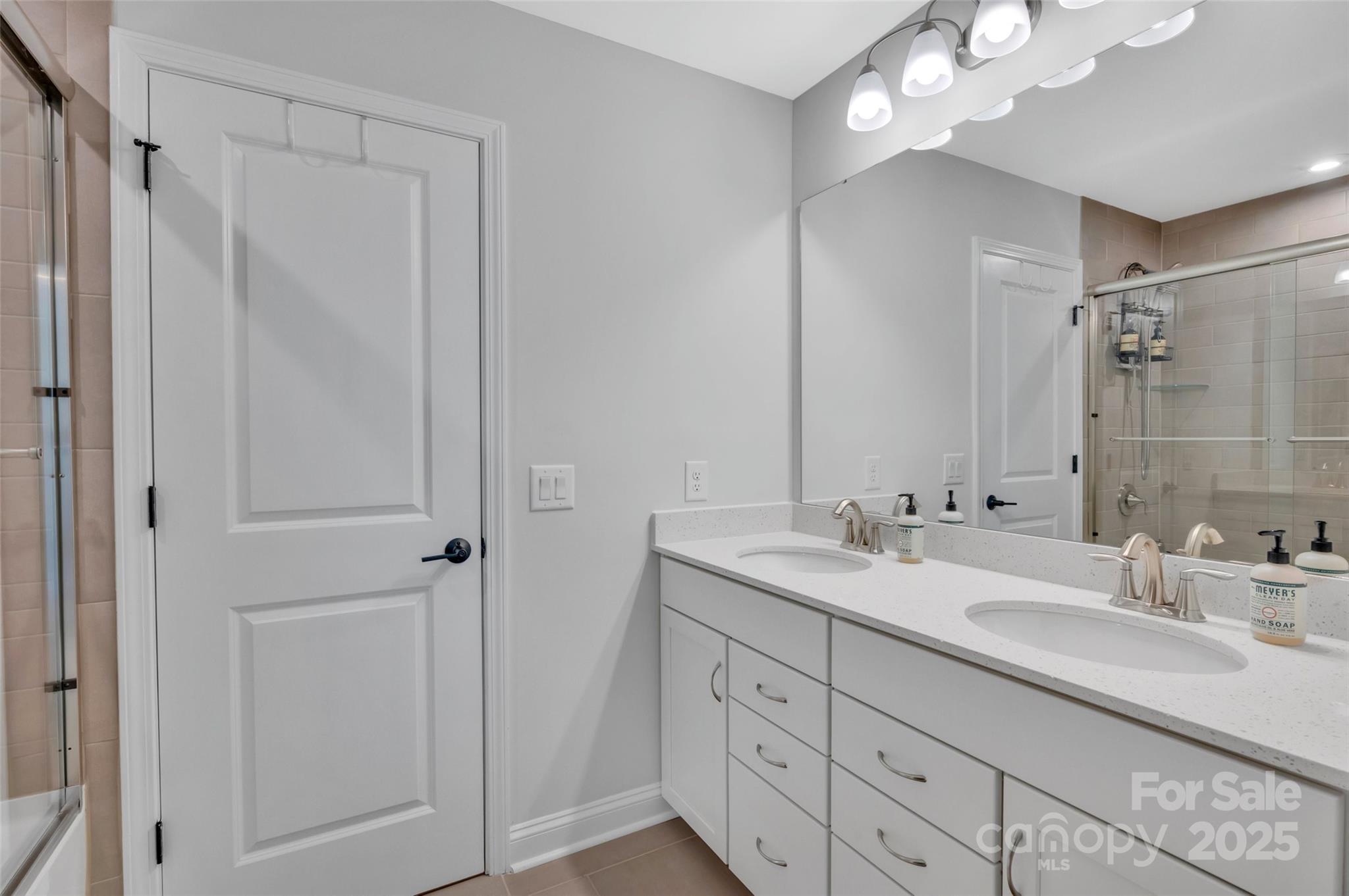 1185 Regions Boulevard Indian Land, SC 29707 - Photo 30 of 41 a bathroom with a double vanity sink mirror and shower