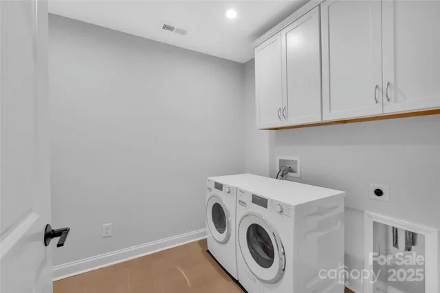 a room with furniture and wooden floor