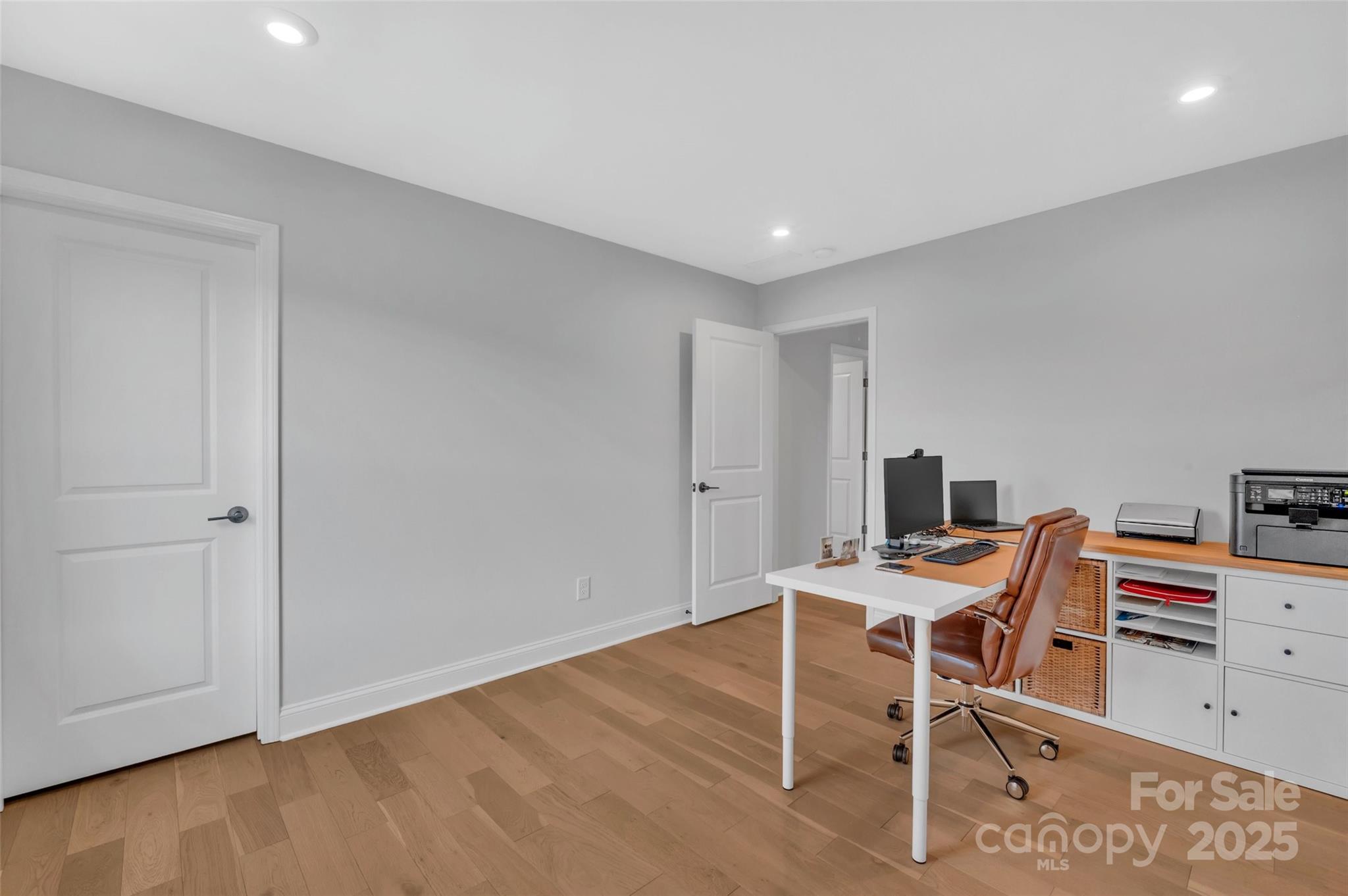 1185 Regions Boulevard Indian Land, SC 29707 - Photo 37 of 41 a room with furniture and wooden floor