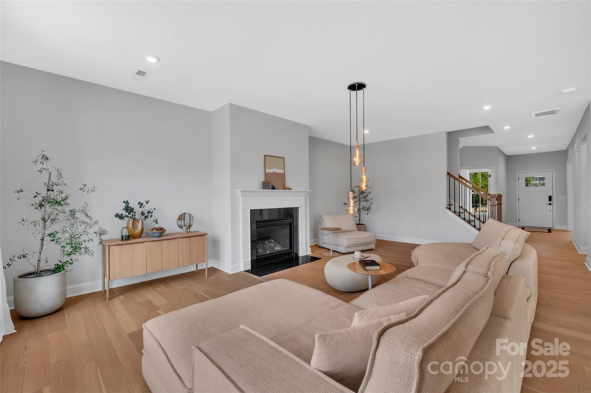 1185 Regions Boulevard Indian Land, SC 29707 - Photo 6 of 41 a bed room with a bed and a chandelier