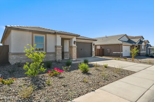 a front view of a house with a porch
