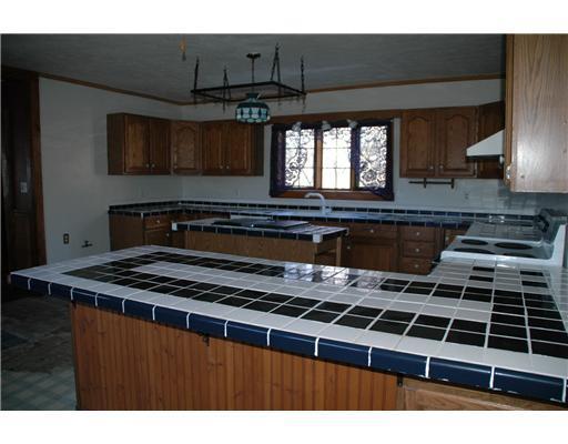 82 Mechanic Falls Road Oxford, ME 04270 - Photo 4 of 25 Kitchen. Big open kitchen, flooring...