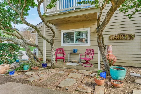 a house view with a garden space
