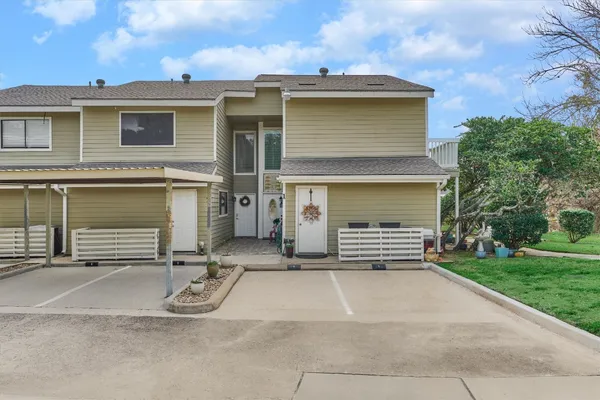 front view of a house with a garage