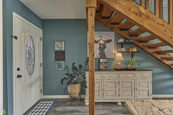 a kitchen with stainless steel appliances granite countertop a stove and refrigerator