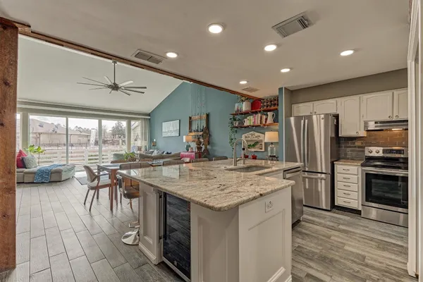a view of a dining room with furniture window and outside view