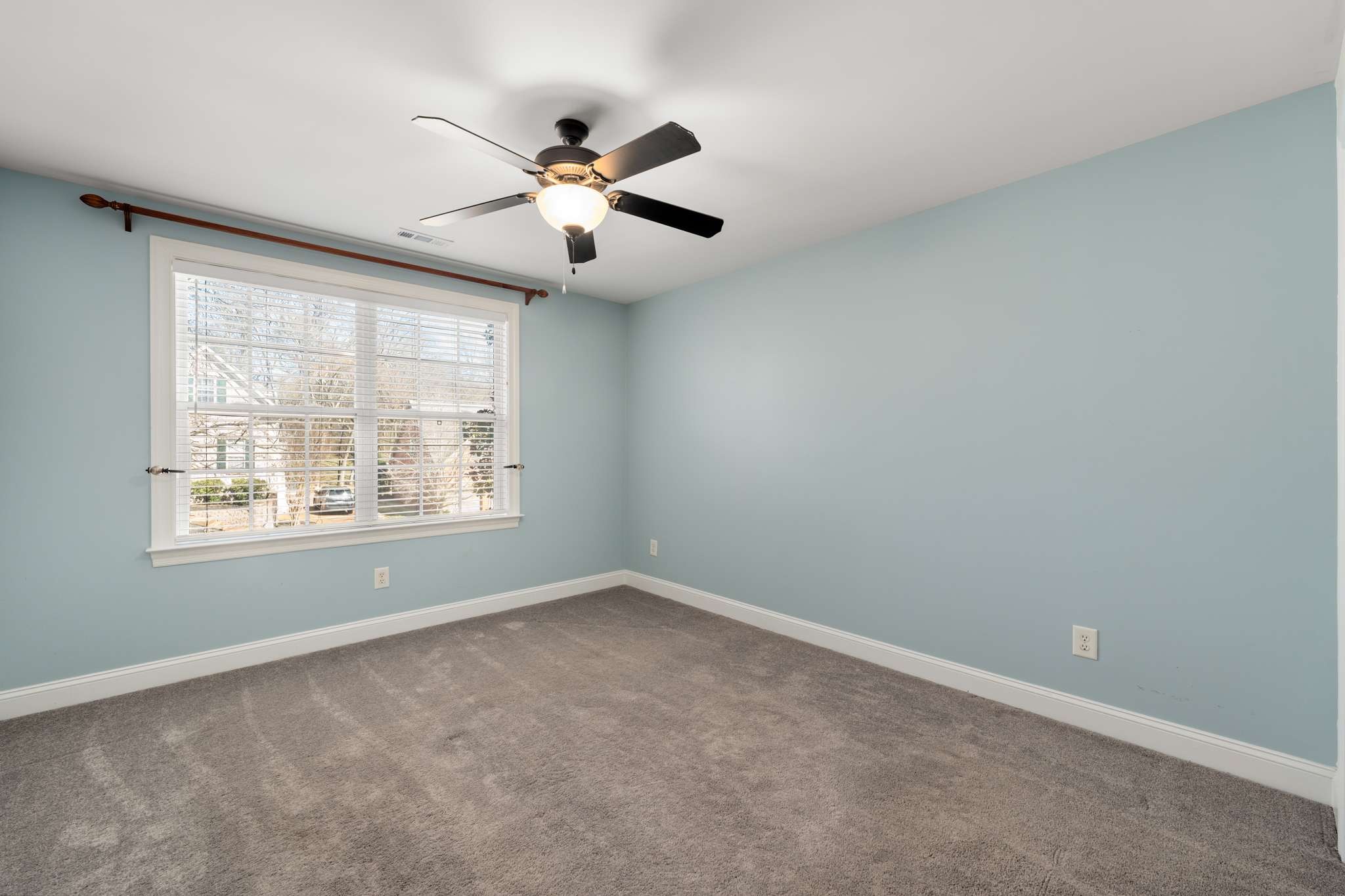 545 Brixham Park Drive Franklin, TN 37069 - Photo 24 of 39 an empty room with windows and fan