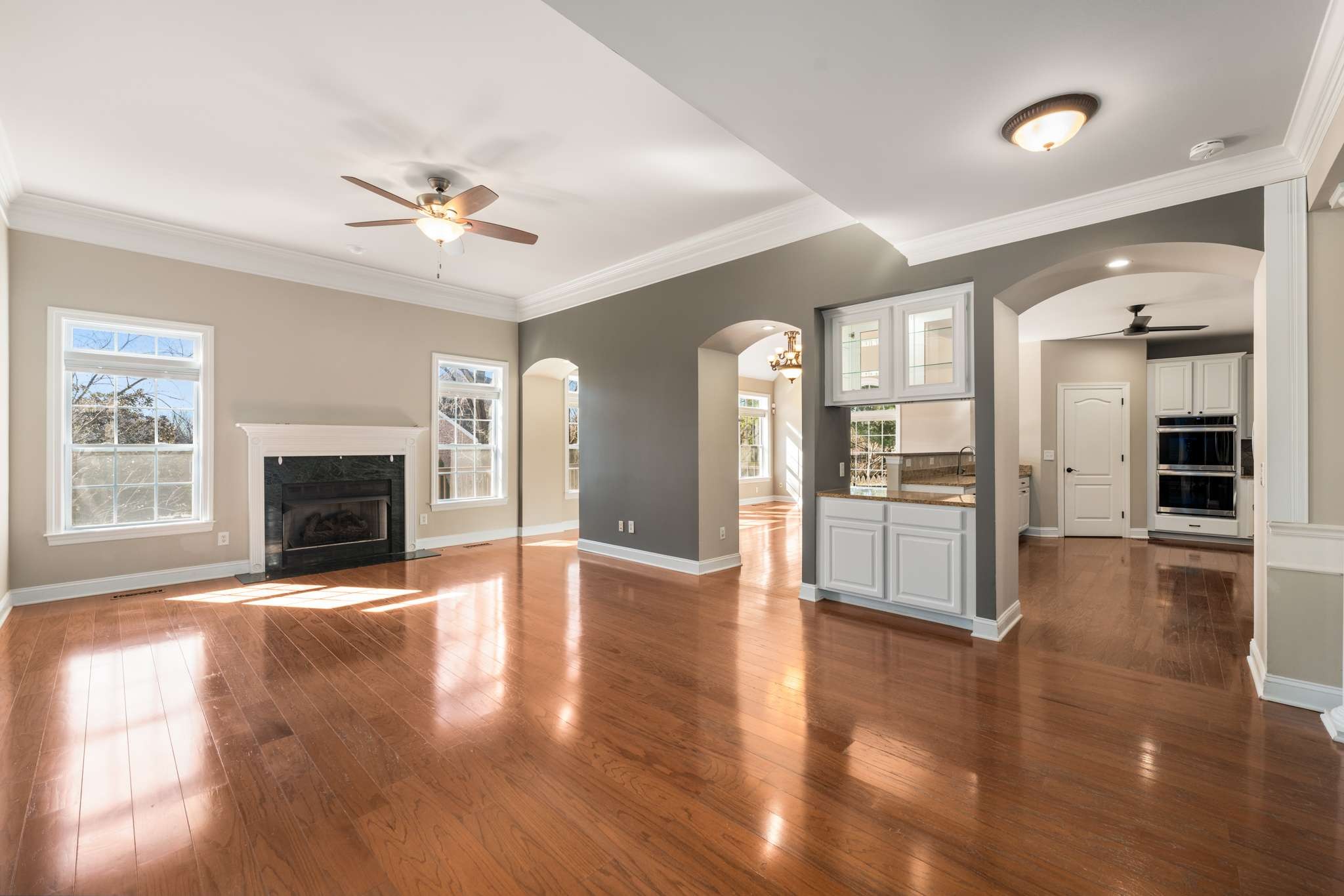 545 Brixham Park Drive Franklin, TN 37069 - Photo 9 of 39 a view interior of a house with wooden floor and a fireplace