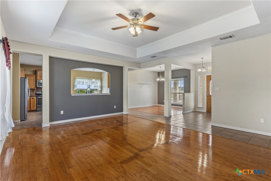 283 County Road 4710 Kempner, TX 76539 - Photo 8 of 47 a view of an empty room with window and wooden floor