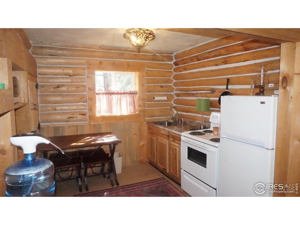 655 Nokomis Road Red Feather Lakes, CO 80545 - Photo 11 of 21 Cozy Kitchen