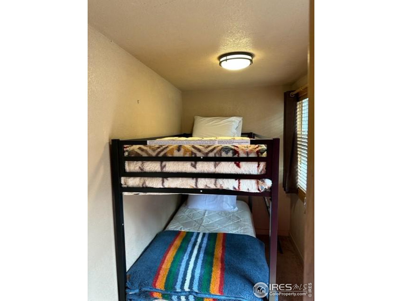 655 Nokomis Road Red Feather Lakes, CO 80545 - Photo 13 of 21 Bunk bed room