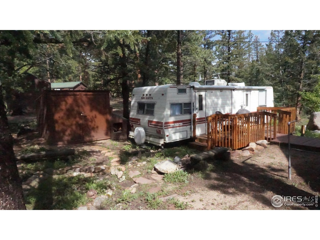 655 Nokomis Road Red Feather Lakes, CO 80545 - Photo 19 of 21 RV parking on property for up to a 29 ft trailer. (RV in photo not included)