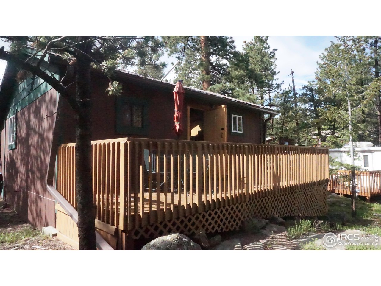 655 Nokomis Road Red Feather Lakes, CO 80545 - Photo 5 of 21 Relax on the deck.