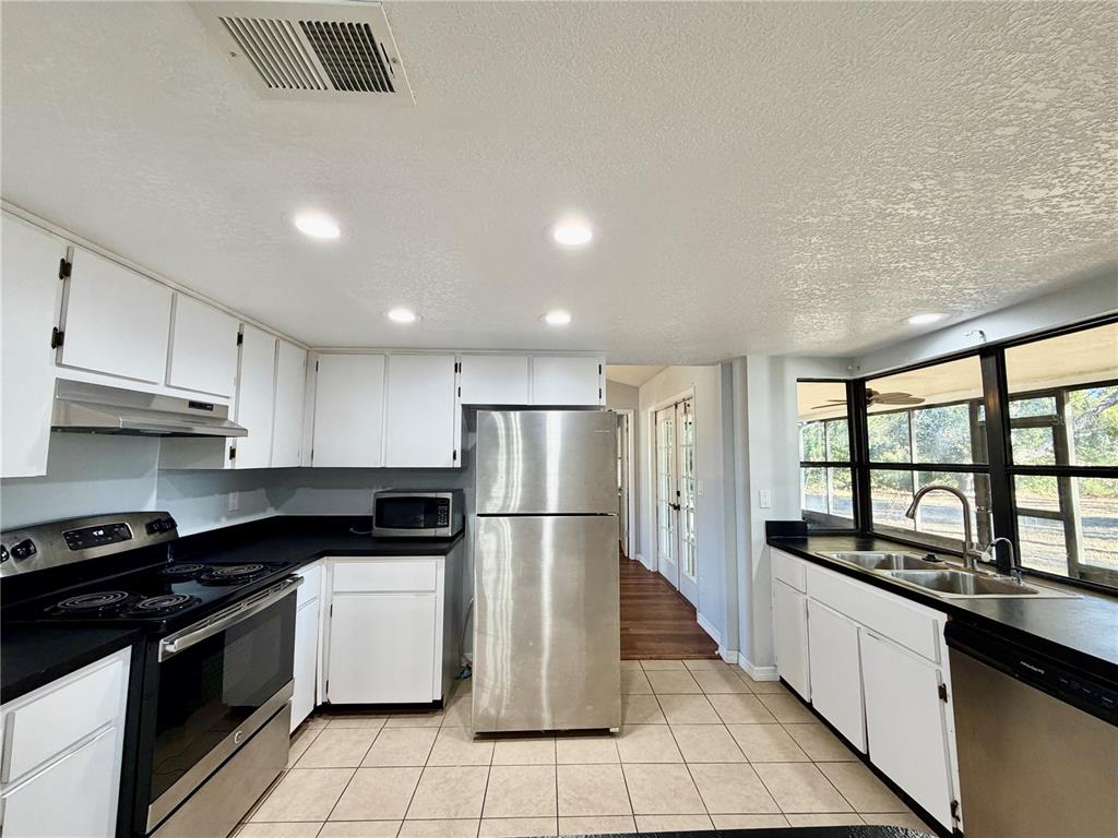 4398 Plumosa Street Spring Hill, FL 34607 - Photo 4 of 28
