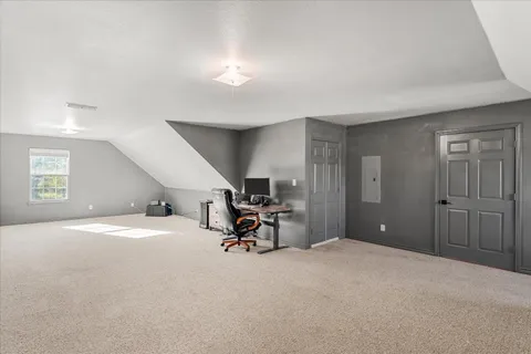 a view of a livingroom and a livingroom with furniture