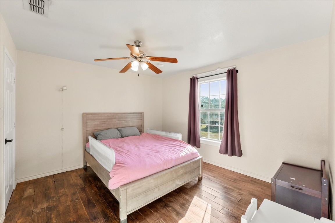 3115 Rains County Road 2610 Alba, TX 75410 - Photo 21 of 50 a bedroom with a bed and a window