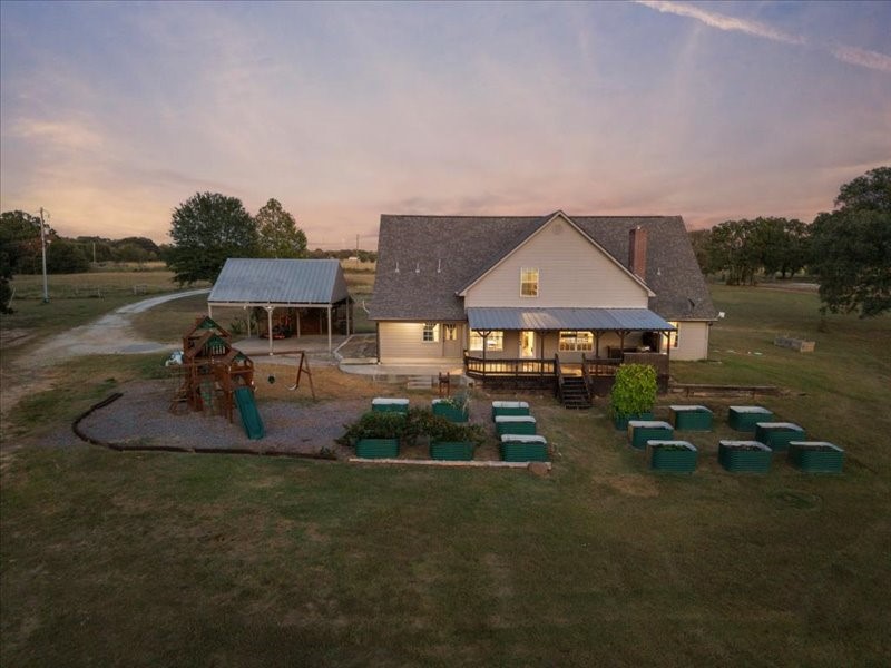 3115 Rains County Road 2610 Alba, TX 75410 - Photo 29 of 50 a aerial view of a house with swimming pool and a yard