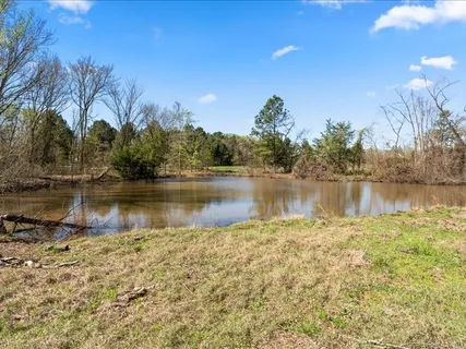 a view of lake view with island in background