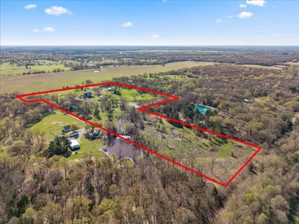 an aerial view of beach and ocean