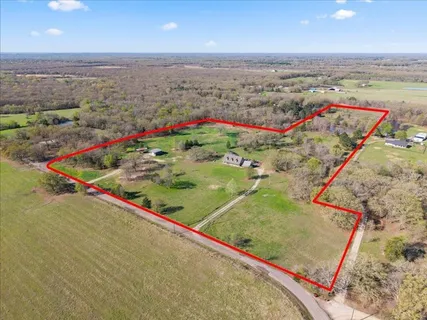an aerial view of beach and ocean