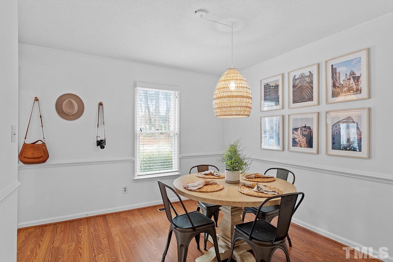 4428 Liverpool Lane Raleigh, NC 27604 - Photo 12 of 24 a view of a dining room with furniture and window