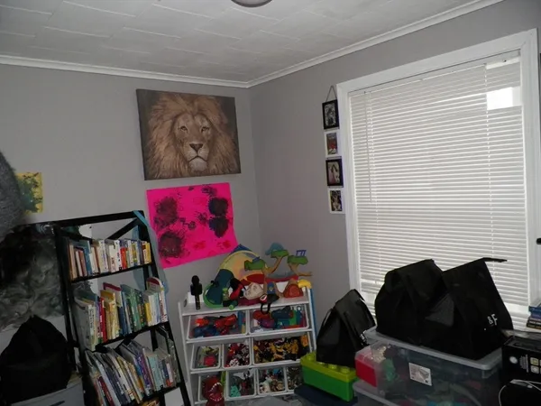 a living room with lots of furniture and a fireplace